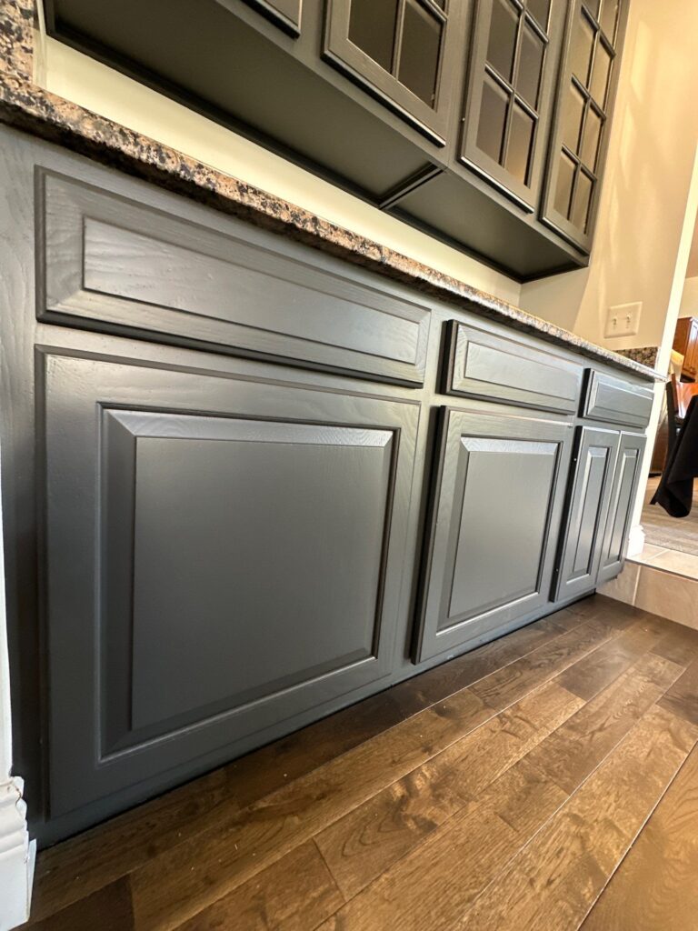 Gray kitchen cabinets.